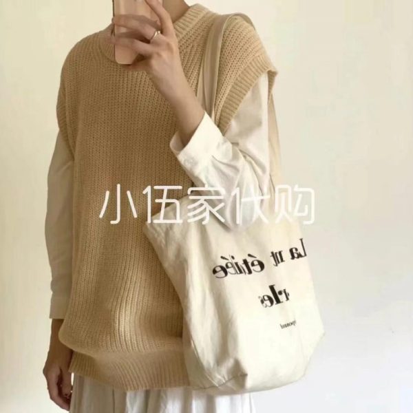 Uniqlo original marked-off knit ves